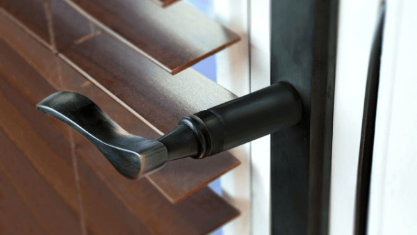 before and after installing a door handle extender